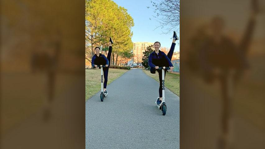 Shen Yun Dancers on Scooters